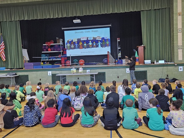 Naomi V. Dunsen-White presenting a Diversity, Unity, Happy program to a school audience
